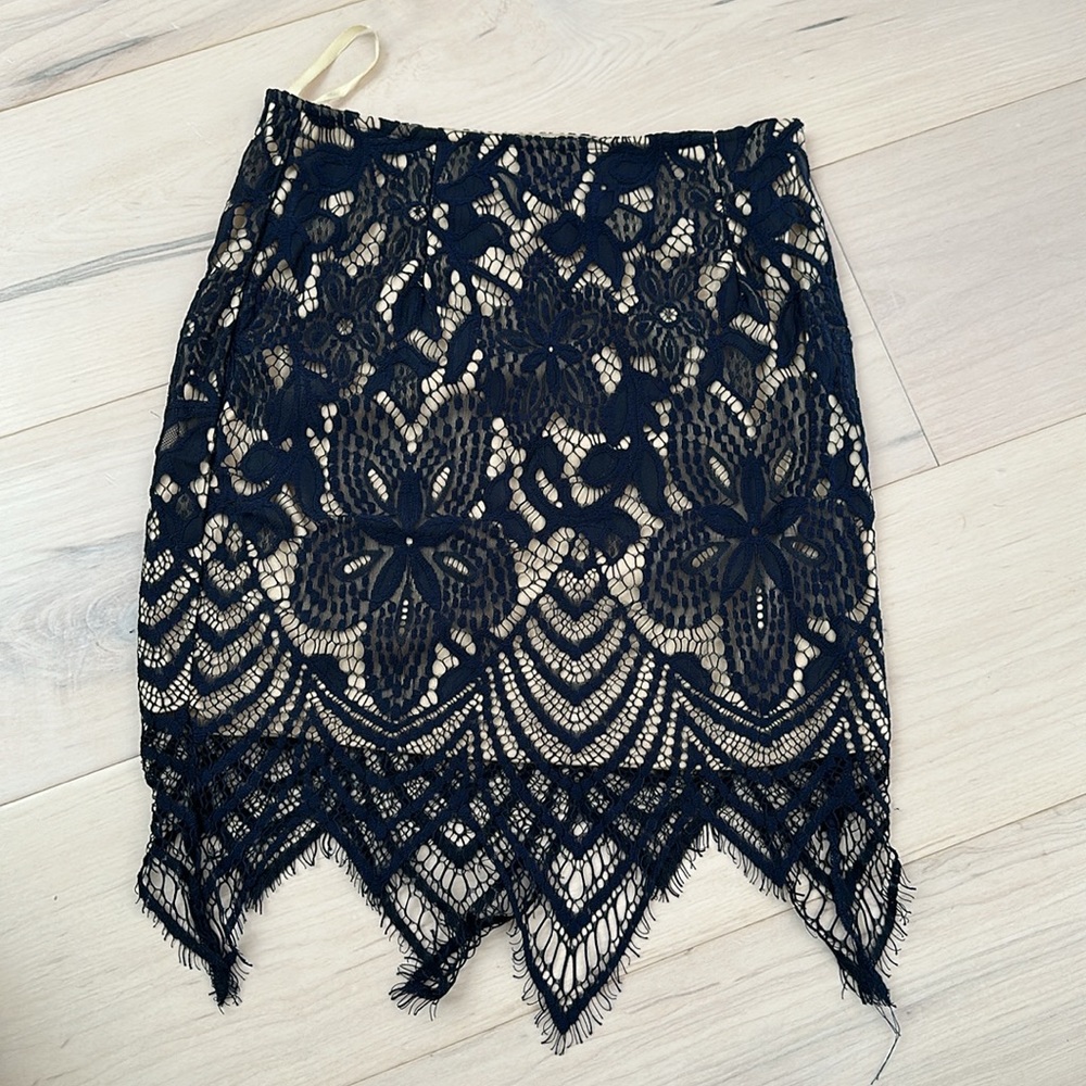 Nellis Size Small Women’s Miniskirt Crocheted Lace over beige underskirt liner